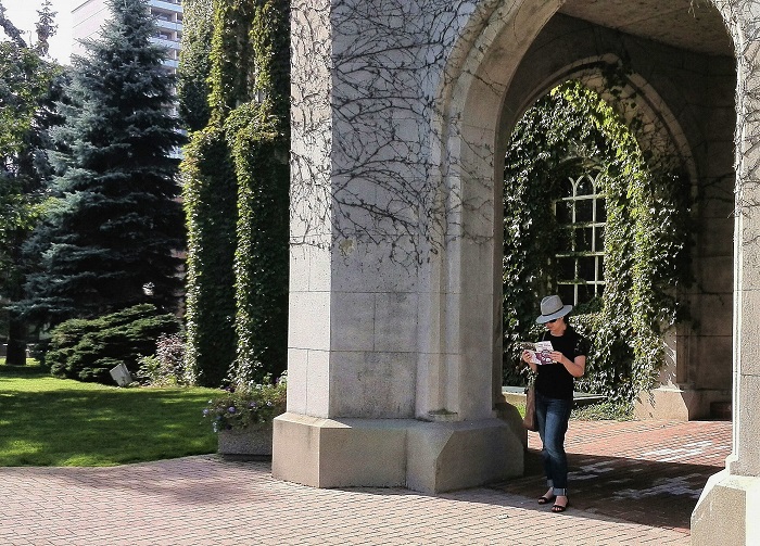 Reading outside the Old Court House in London Ontario