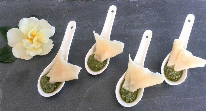 Cheese and pesto wonton wrapper party appetizer