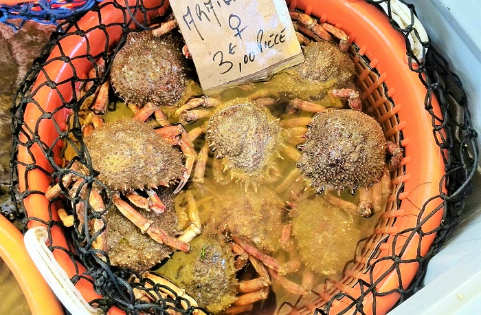 Basket with crabs at Paris Bastille Market
