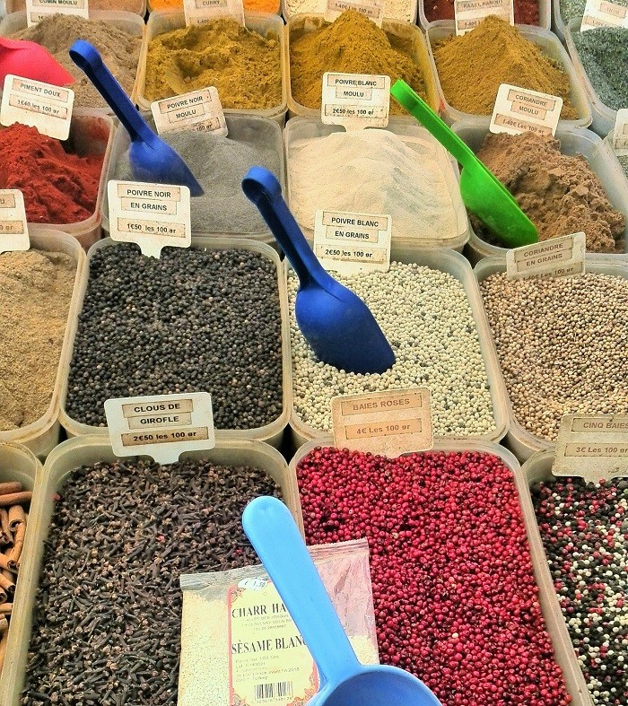 Tubs of spices - Bastille Market in Paris